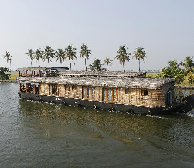 Showing Image Of Kerala Boat And Lake.